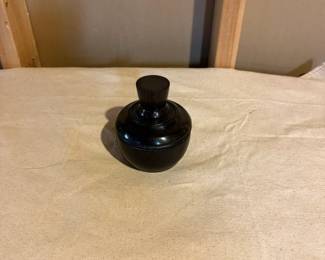 Small black turned wood decorative container with lid. Great accent piece for shelf, desk, or collectible display.
