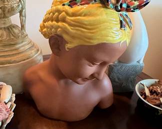 Terracotta Bust of a Young Girl with a Bow