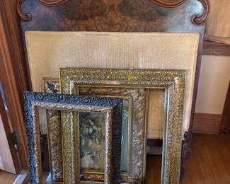 Antique frames & upholstered bed