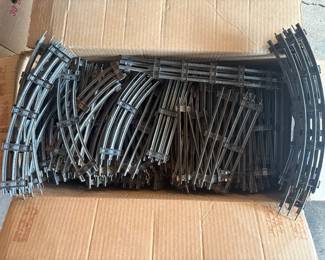 Large egg box full of Lionel train track