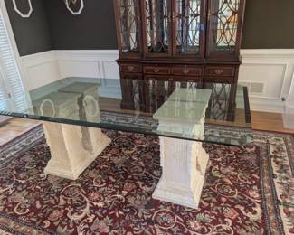 Glass top table with columns