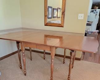 Willet Furniture- Duncan Phyfe style drop-leaf table capable of extending up to 86 inches.