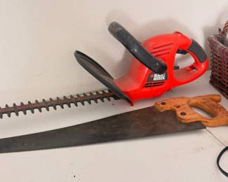 Black & Decker electric hedge trimmer, And Hand Saw 