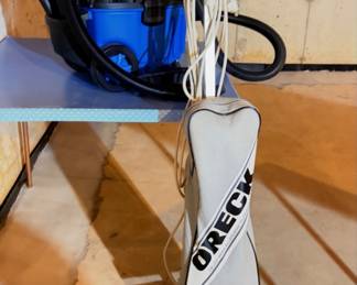 Vacmaster blue wet/dry vacuum cleaner and Oreck XL vacuum cleaner