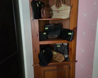 Pine with an assortment of lovely purses