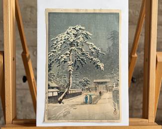 "Honmon Temple at Ikegami", an original Japanese woodblock print by listed artist, Kawase Hasui. This woodblock is hand-signed and measures (without frame), 15” H x 10.25” W. Kawase Hasui (1883–1957) was the foremost landscape artist of the shin-hanga ("new prints") movement. Renowned for his serene, atmospheric scenes of snow, rain, and moonlight, he designed approximately 620 woodblock prints over his 40-year career. In 1956, the Japanese government honored him as a Living National Treasure. $5,000 reserve.