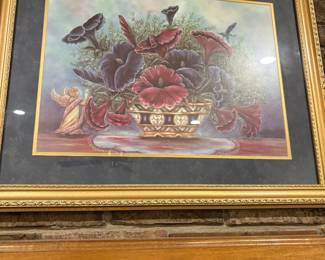 Framed and matted picture in living room