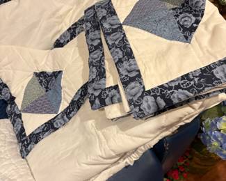 This quilt set includes 2 pillow shams - hand stitched