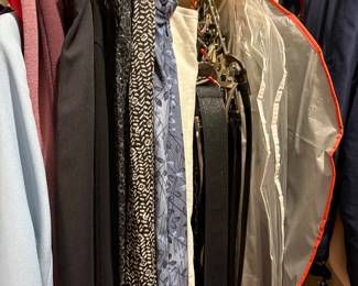 Men’s clothes in master bedroom closet 
