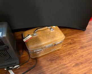 Bedroom off Living area - suitcase