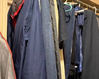 Men’s clothes in master bedroom closet 