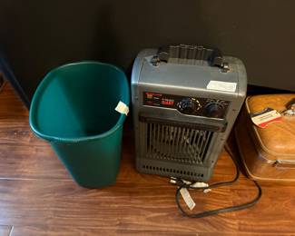 Bedroom off living area - wastebasket & electric heater