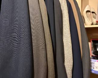 Men’s clothes in master bedroom closet 