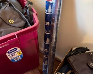 Umbrella and more purses in bedroom off living area