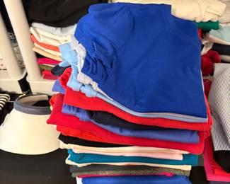 More clothing in bedroom off living area