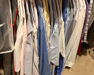 Men’s clothes in master bedroom closet 