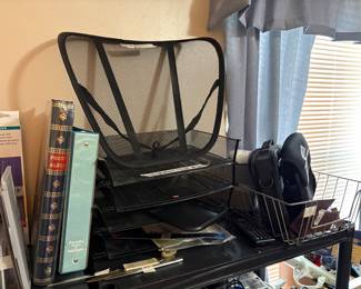 Office off kitchen - desk items, back of chair 
