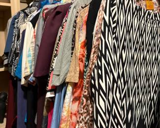 Women’s clothing in master bedroom closet 