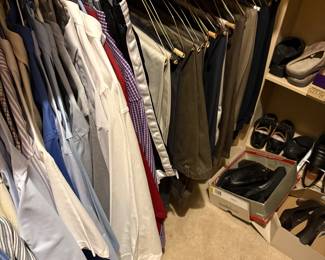 Men’s clothes in master bedroom closet 