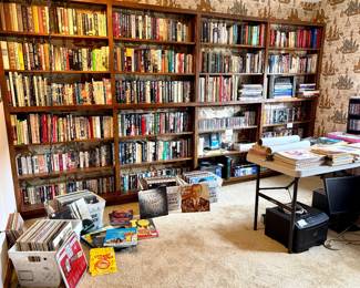 So many books and vinyl records. 
