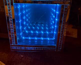 Custom-made Infiniti mirror clock