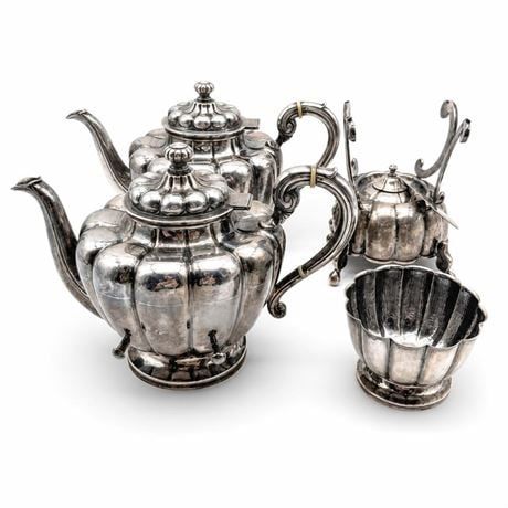 Lot 517: Sanborns Mexico City Sterling Silver Tea & Coffee Service Total weight 3313 gram — current bid $1,300