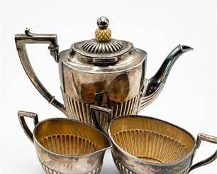 Lot 604: German .800 Silver Three-Piece Bachelor Tea Service — current bid $25