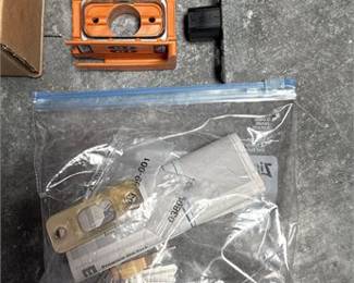 Lot 0902: Kwikset Door Hardware Installation Kit, Parts in Box (photo 4)
