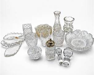 Lot 642: Cut & Pressed Glass Tableware Lot with White-Metal Caster — current bid $5