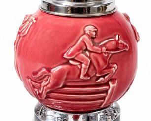 Lot 802: Figural Musical Cigarette Dispenser, Equestrian Relief — current bid $7