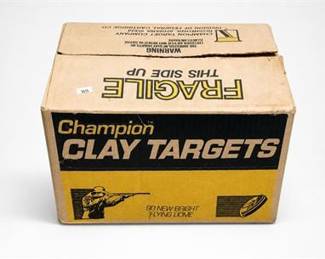 Lot 0740A: Champion Target Co. Clay Shooting Targets, Open Case — current bid $5