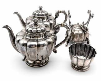 Lot 517: Sanborns Mexico City Sterling Silver Tea & Coffee Service Total weight 3313 gram — current bid $1,300