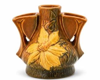 Lot 559: Roseville Pottery Clematis Flower Frog, Shape 50-4 — current bid $10