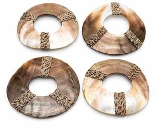 Lot 0931: Four Mother-of-Pearl Shell Discs with Woven Fiber Bands — current bid $5