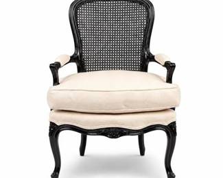 Lot 0550: Louis XV Style Ebonized Caned Fauteuil Armchair — current bid $51