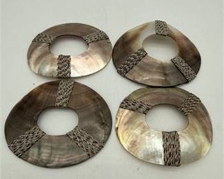 Lot 0931: Four Mother-of-Pearl Shell Discs with Woven Fiber Bands (photo 4)