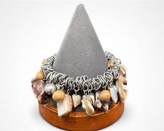 Lot 493: Silver-Tone Stretch "Cha-Cha" Bracelet, Stone/Shell/Wood — current bid $5