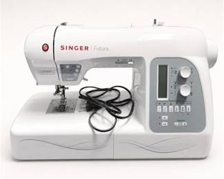 Lot 963: Singer Futura XL-550 Computerized Sewing Machine — current bid $21