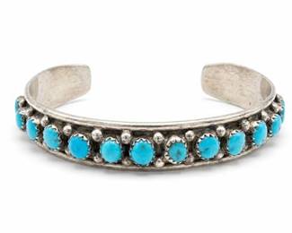Lot 655: Sterling Silver & Turquoise Row Cuff Bracelet — current bid $63