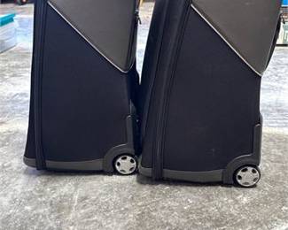 Lot 32: BMW Collection Black Ballistic Nylon Wheeled Suitcases, Pair (photo 3)