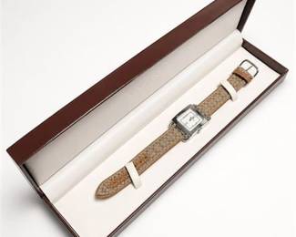 Lot 955: Coach Women's Square Stainless Steel Watch with Canvas Strap — current bid $21