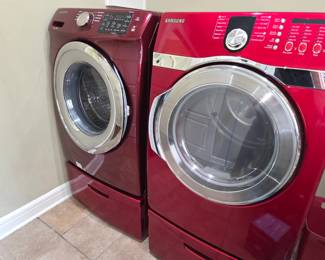Samsung front load washer & dryer on pedestal bases
