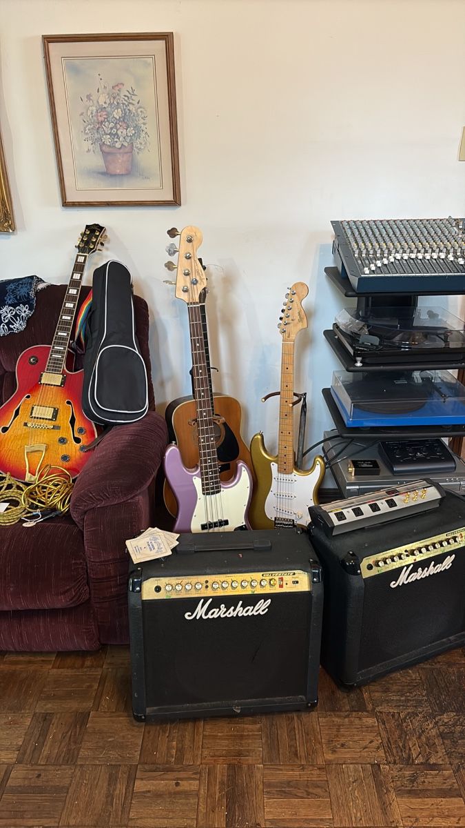guitars, amps, record players, mixing board