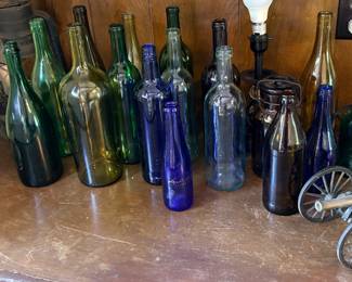 Old bottles, metal cannon, Oil lamp