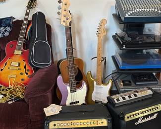 guitars, amps, record players, mixing board