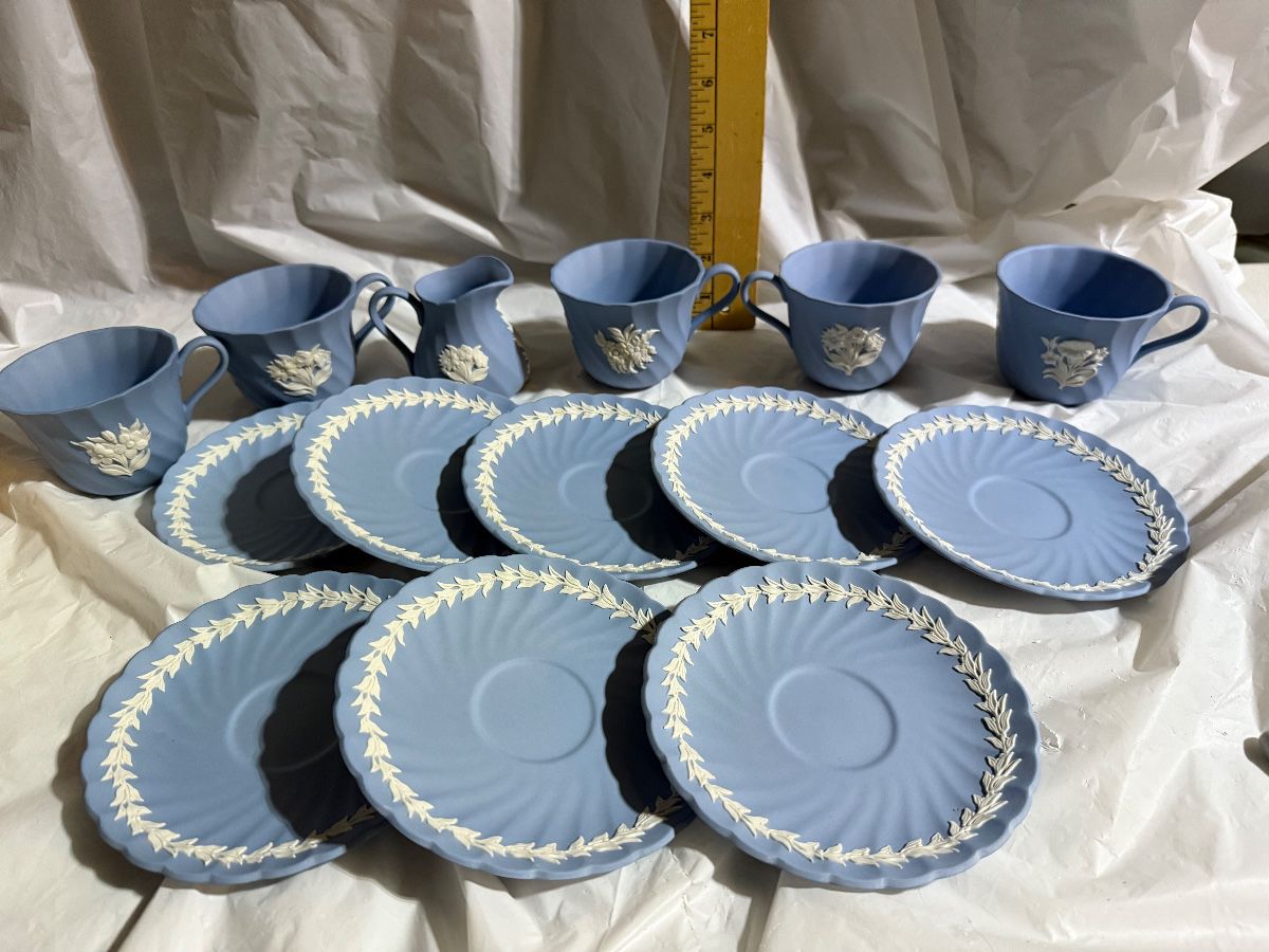 Wedgwood 8 Saucers, 5 Cups, 1 Creamer $60.00