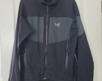 Lot #79 - Arc'teryx Men's Small Black Softshell Jacket with Fleece Lining and Zippered Pockets