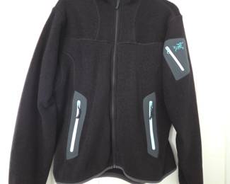 Lot #76 - Arc'teryx Women's Large Black Fleece Jacket with Zip Pockets and Logo Detailing
