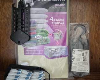 Lot #45 - Jumbo Vacuum-Seal Space-Saver Tote w/ Hook & Hang Collapsible Space Saving Hangers & Buttoned Storage Clips