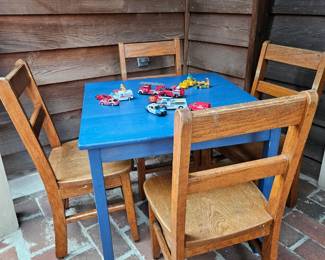 Childrens Table (23x23x21 H) and 4 Wooden Chairs